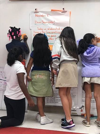 Children at a whiteboard